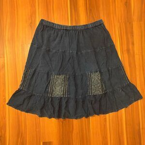 flowy lightweight denim knee length skirt with blue crochet details